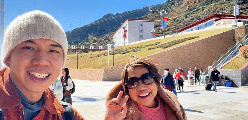 Me and Mom ending our trip at Jiǔzhàigōu (九寨沟) - Jiuzhaigou Travel Guide: Magical Valley - Leo Trails