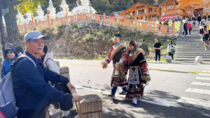 Couple wearing Tibetan traditional clothings- Jiuzhaigou Travel Guide: Magical Valley - Leo Trails