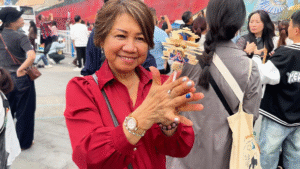 Mom playing spinning thing in Lǐzǐbà Station (李子坝) - 7 Must-Visit Spots in Chongqing - Leo Trails
