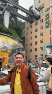 Me Posing at Lǐzǐbà Station (李子坝) - 7 Must-Visit Spots in Chongqing - Leo Trails