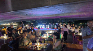 Boat under the bridge - Bangkok Dinner Cruise for a Memorable Birthday - Leo Trails