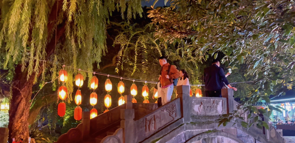Me walking at the bridge in Jinli Ancient Street - Chengdu Top 9 Must-Visit Spots - Leo Trails