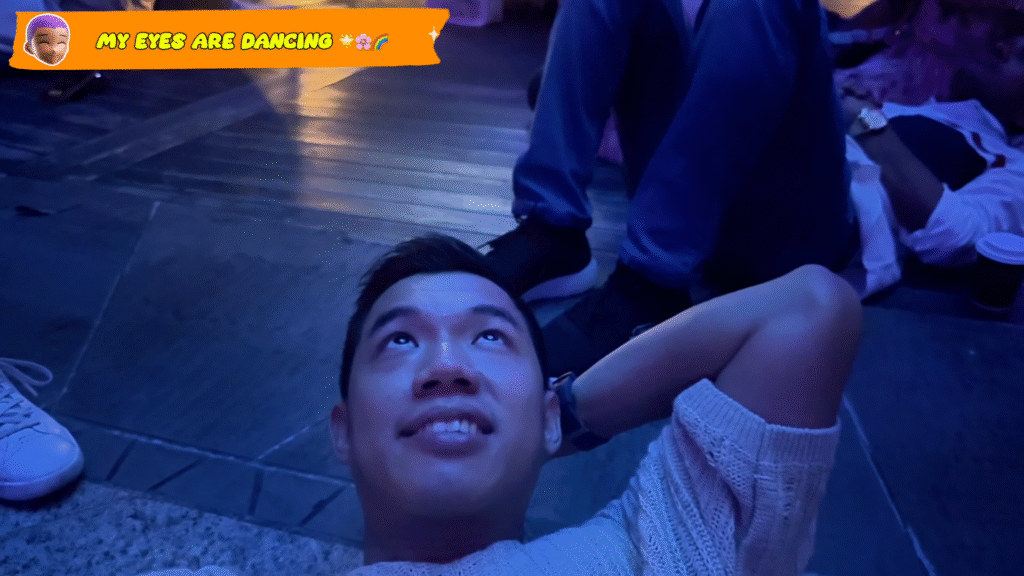 Me staring at the Supertree above night - How to Enjoy Singapore Without Breaking the Bank - Leo Trails