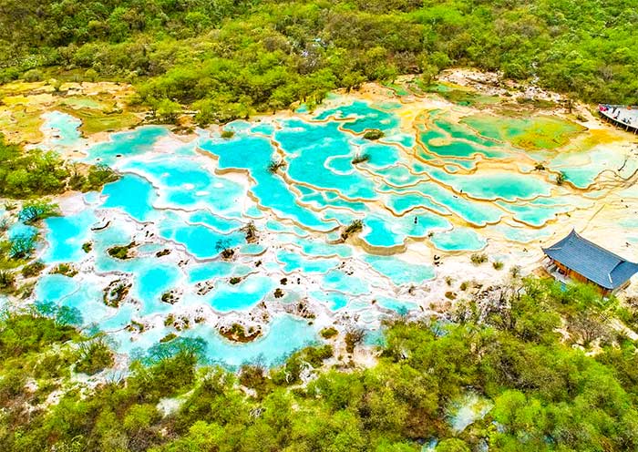 Five-color pools view - Exploring Huanglong: A Breathtaking Experience - Leo Trails