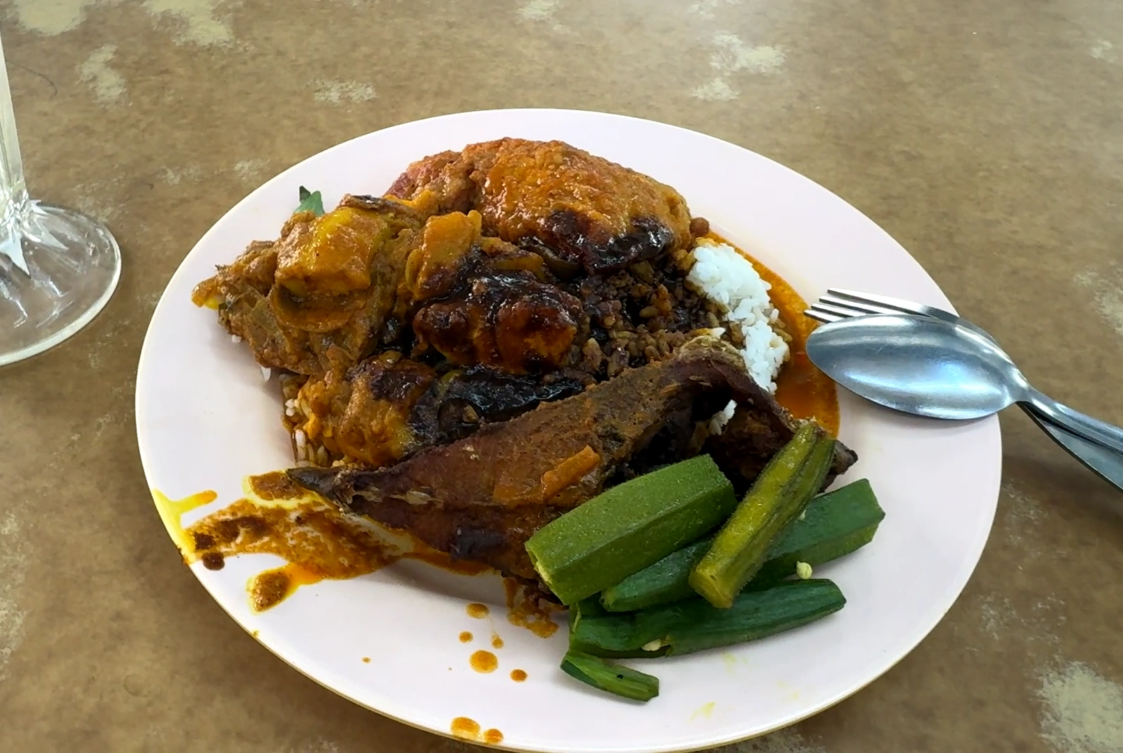 A plate of nasi kandar -Try KL Dishes That Locals Love - leo trails