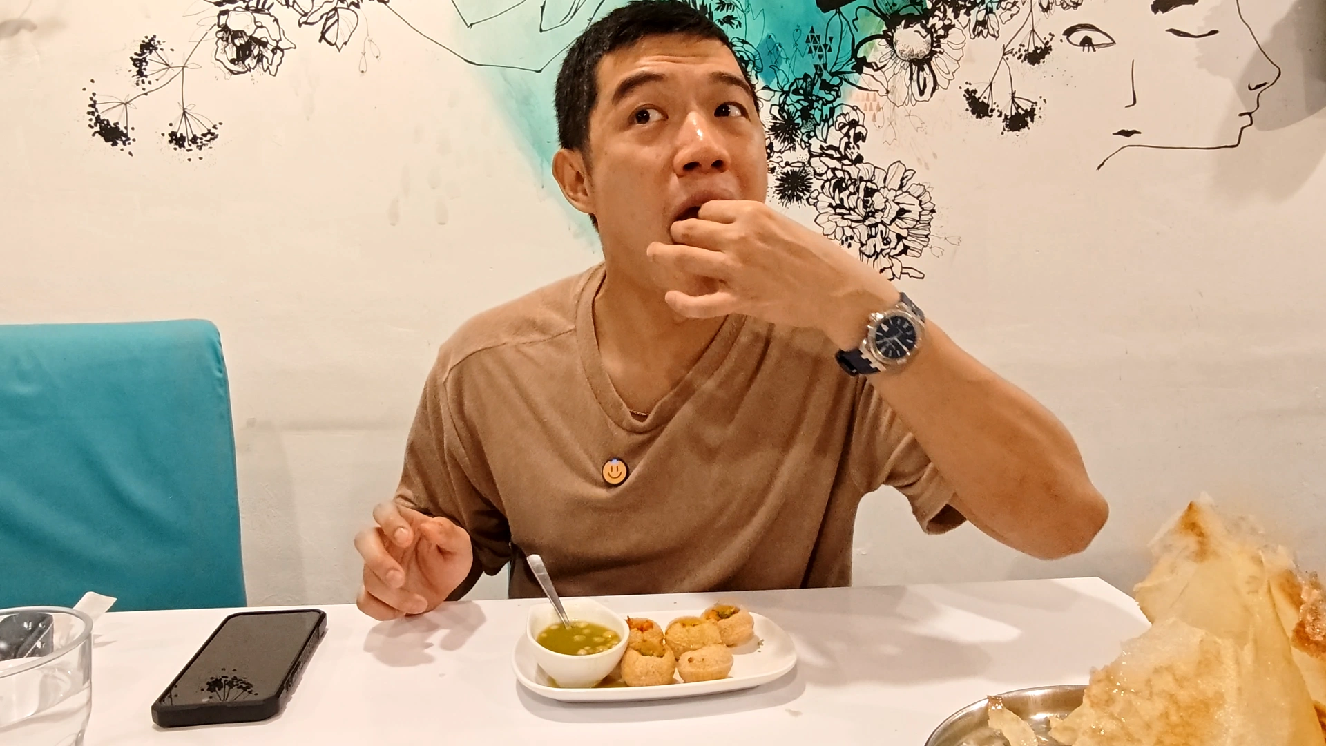 Me eating the pani puri - Try KL Dishes That Locals Love - leo trails
