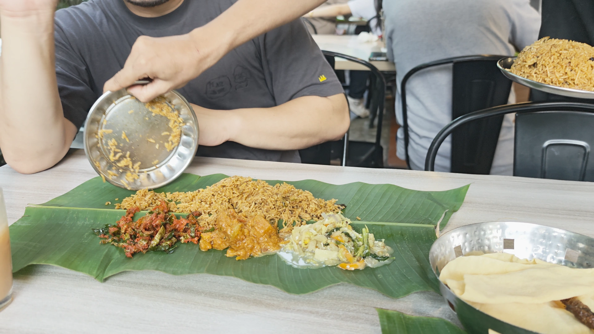 Nasi Briyani on the table -Try KL Dishes That Locals Love - leo trails