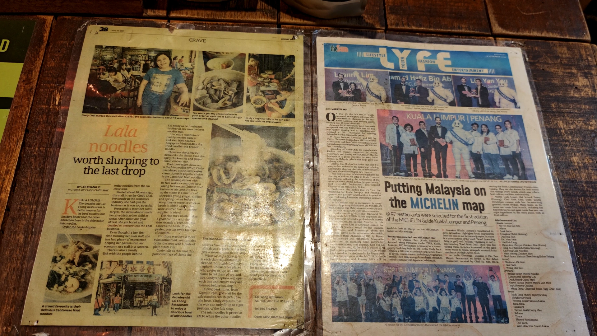 Restaurant Michelin award in newspaper - Try KL Dishes That Locals Love - leo trails