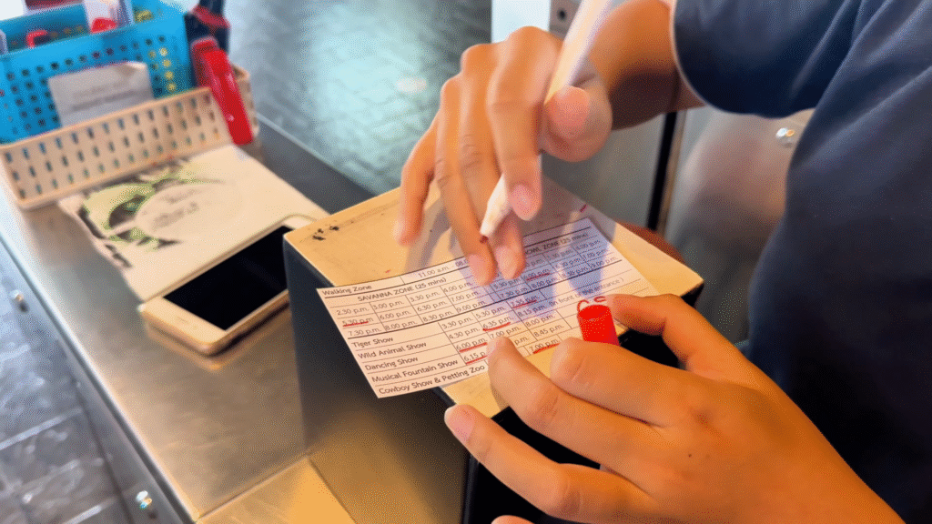 Staffs mark the shows on the ticket - The Best of Chiang Mai Night Safari at Night - Leo Trails