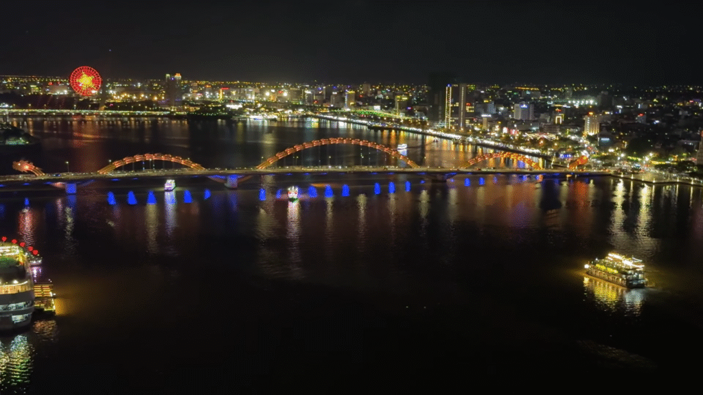 Night view from my balcony overlooking the Han River - Discover One of the Best Hotel in Da Nang - Leo Trails