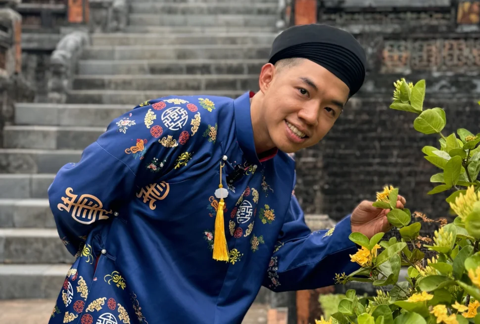 Me Posing near the plant at Minh Mang Tomb - 7 Fun Things to Do in Hue, Vietnam - Leo Trails