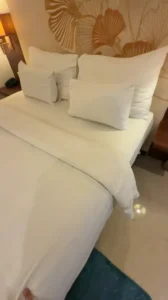 Bed with Pillows - 🏨 Where to Stay in Batam for a Weekend Getaway - Leotrails