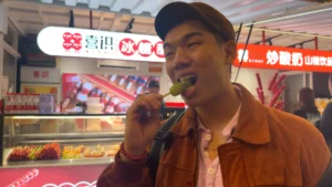 Me eating Tang Hu Lu - Yu Garden Shanghai: Calm by Day, Alive by Night 🌱 - Leotrails