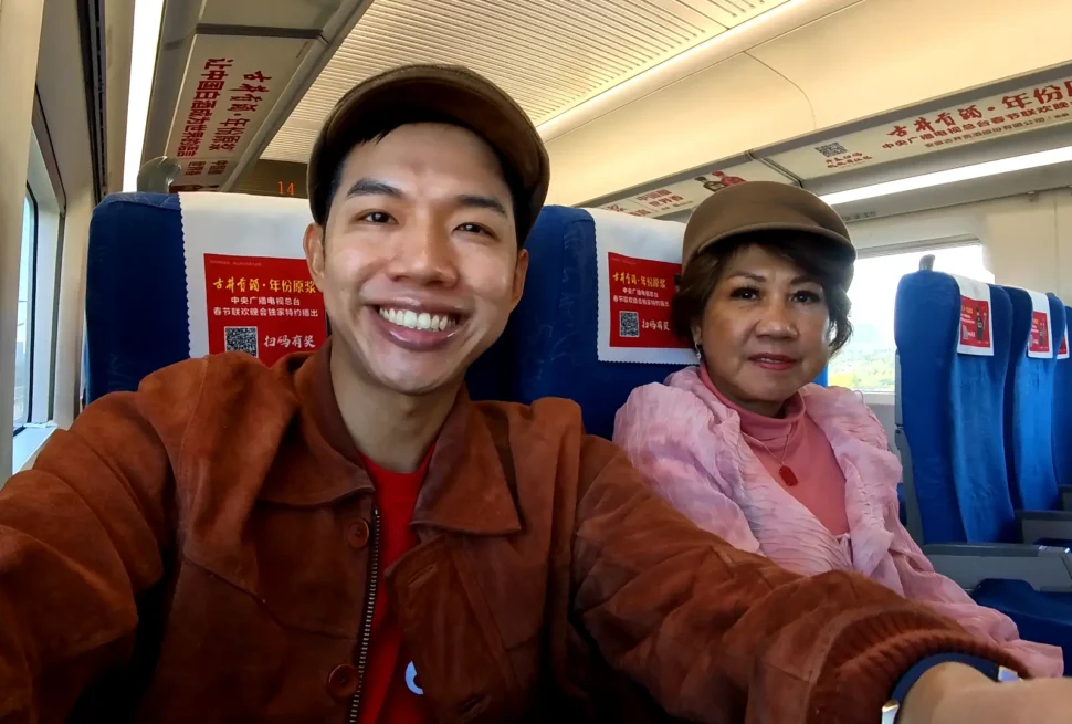 Me smiling on the camera with my mom beside me - Shanghai to Suzhou Day Trip: Complete Train Guide 🚇 - Leotrails