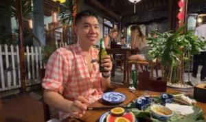 Me trying the Huda Beer - What to Eat in Hue: Best Dishes at Madam Thu 🍽️ - Leotrails