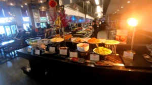 A wide variety of dishes on the table counter - How to Buy Fansipan Mountain Tickets the Easy Way 🎟️ - Leotrails