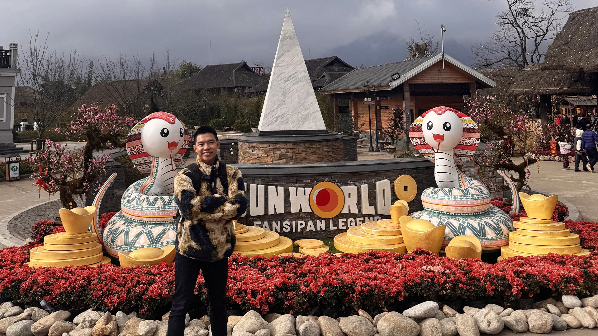Me posing in front of Sunworld Fansipan Legend - How to Buy Fansipan Mountain Tickets the Easy Way 🎟️ - Leotrails