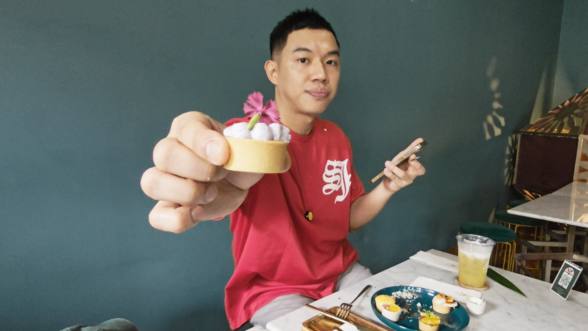 Me showing one of the scones - Song Wat Bangkok: How to Spend a Day Here 🏠 - Leotrails