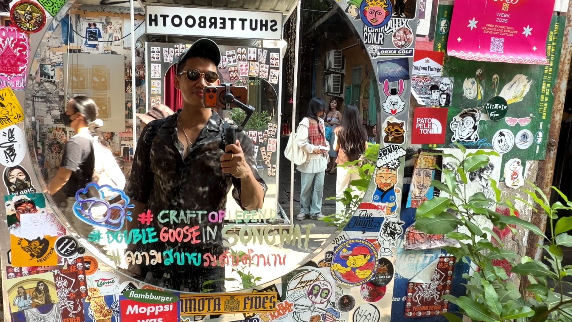 Taking some mirror selfies in Song Wat Alley - Song Wat Bangkok: How to Spend a Day Here 🏠 - Leotrails