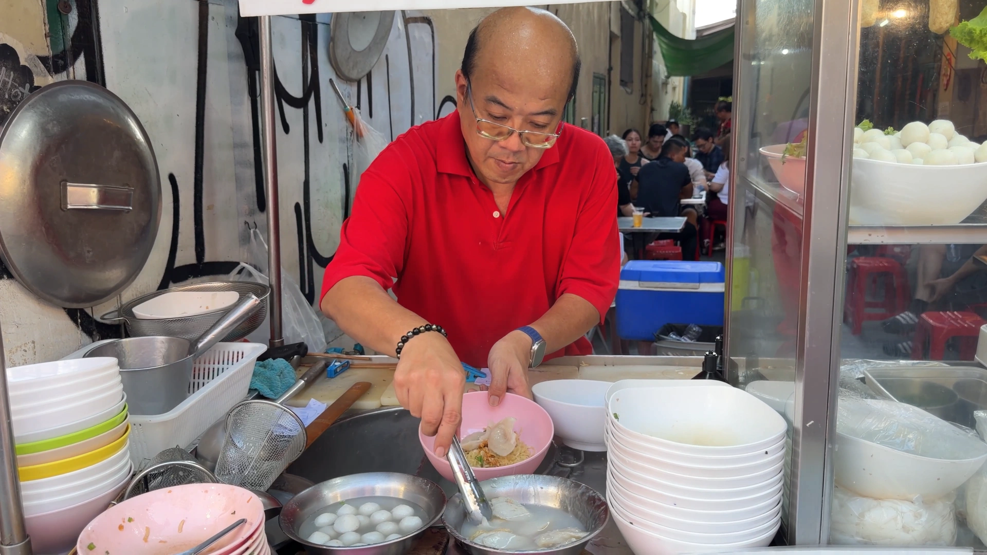 The owner of Lim Lao Sar Fishball Noodles - Song Wat Bangkok: How to Spend a Day Here 🏠 - Leotrails