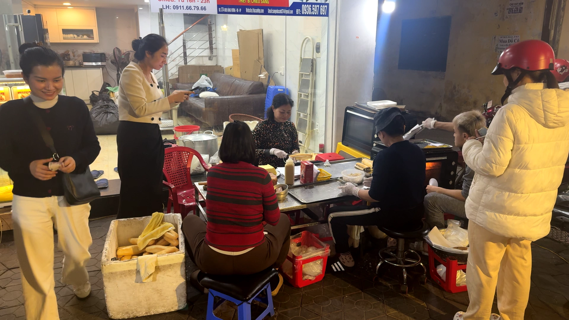Workers making a Bánh mì - What to Eat in Haiphong: Amazing Local Food Experience😋 - Leotrails